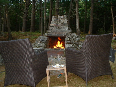 The outdoor fireplace on the ledge